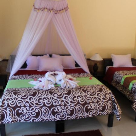 Mans Cottages & Spa Pemuteran Kamer foto