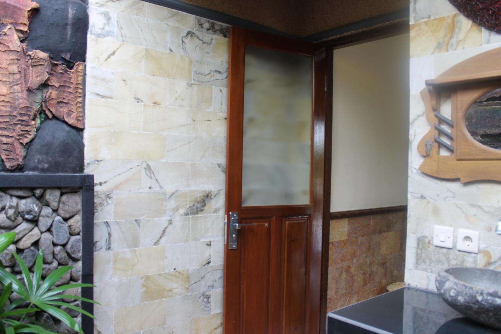 Mans Cottages & Spa Pemuteran Kamer foto
